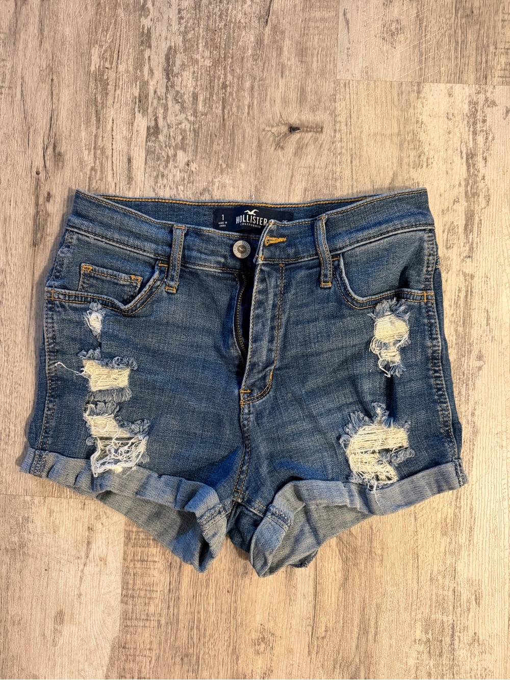 Hollister Distressed Roll-Cuff Denim Shorts in Medium Blue